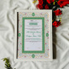 This beautifully crafted Nikahnama features a Mughal-style arch layout bordered by soft pastel floral detailing in pink and gree