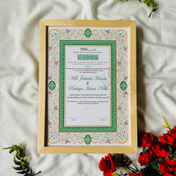 This beautifully crafted Nikahnama features a Mughal-style arch layout bordered by soft pastel floral detailing in pink and gree